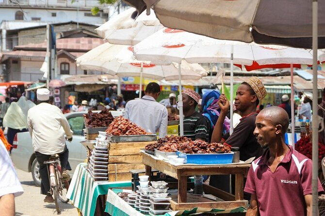 Stone Town Guided Historical Walking City Tour - Wandering Stone Town streets: doors, shops, and photo-friendly corners