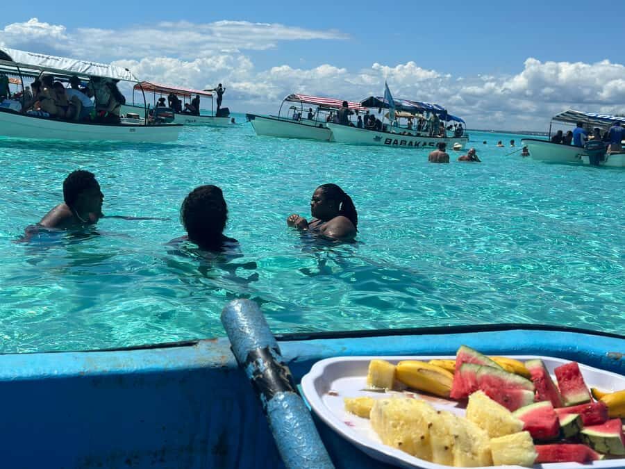 Zanzibar: Mnemba Island Dolphin and Snorkeling Tour - The Beach Time: Fresh Fruit, Scenic Views, and a Chance to Unwind