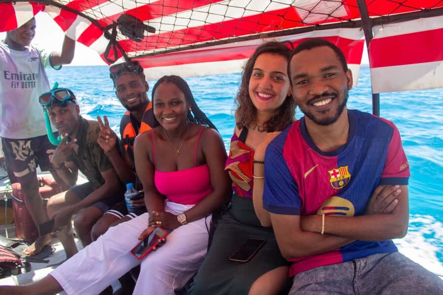 Zanzibar: Mnemba island Snorkeling & Boat Tour with Lunch - Getting there: Zanzibar pickup, van ride, and boat hop